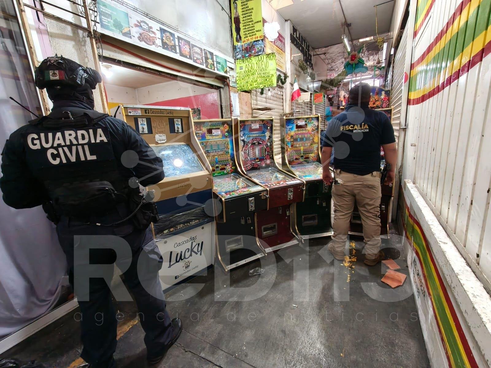 Guardia Civil apoya en cateos donde aseguran 64 máquinas tragamonedas en Morelia